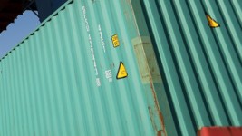 The girl alleges she was made to sleep in a shipping container for more than four months. 