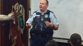 Senior Constable Dean Michael Perkins speaking at a NSW school. 